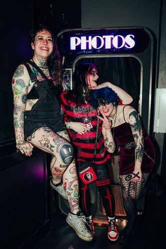 JISEI in a photo booth after a show